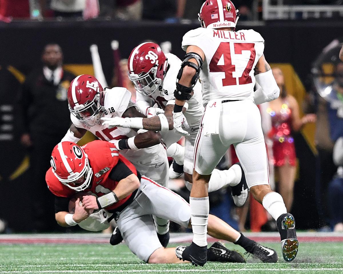 PHOTOS vs. Alabama National Championship game Slideshows