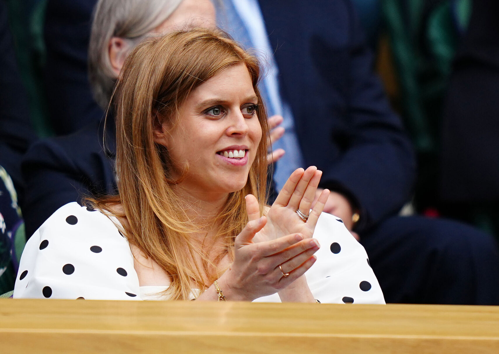 Princess Beatrice granddaughter of Queen Elizabeth II gives