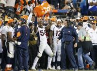 Denver Broncos Head Coach Gary Kubiak is doused with Gatorade by MVP Von  Miller (58) at the end of Super Bowl 50 in Santa Clara, California on  February 7, 2016. The Denver