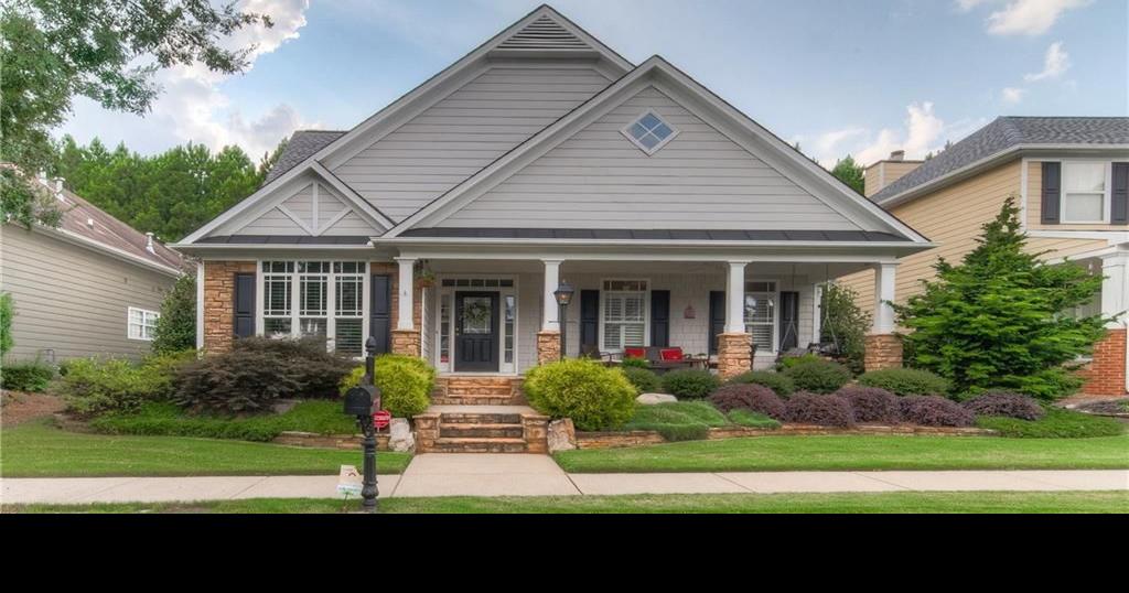 ON THE MARKET Charming craftsman with front porch in Old Suwanee