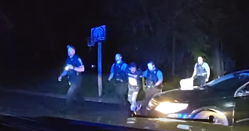 Gwinnett officer, suspect fight over Taser after chase