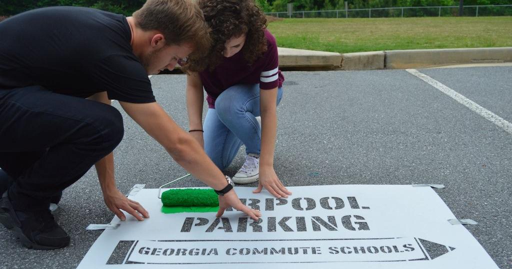 Environmentally friendly Lanier High rolls out carpool parking spots ...