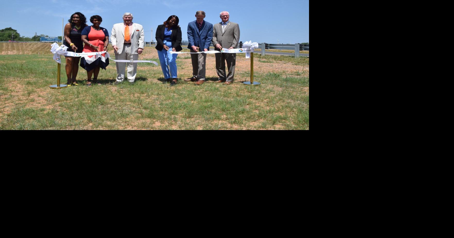 officials celebrate completion of Harbins Road, 316