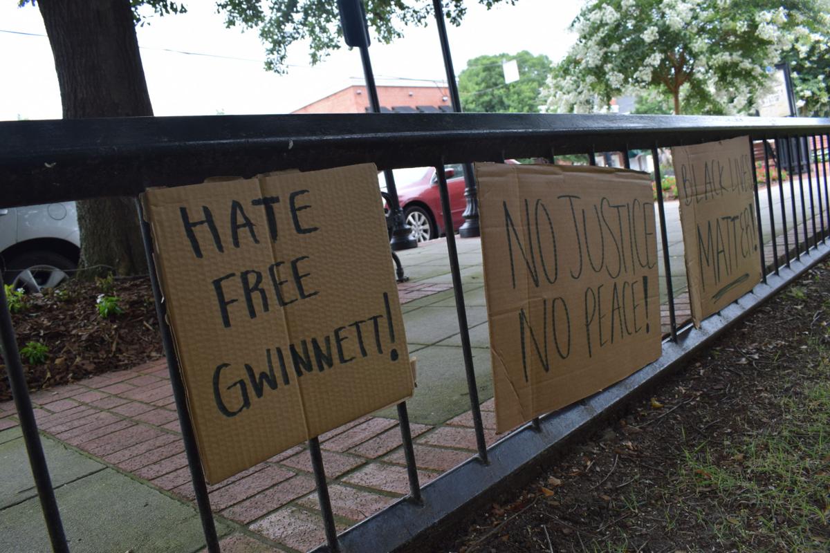 Confederate Monument protest Hate Free Gwinnett sign