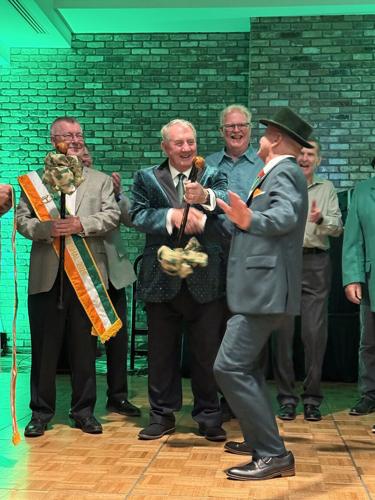 Irish Channel Club passes the shillelagh