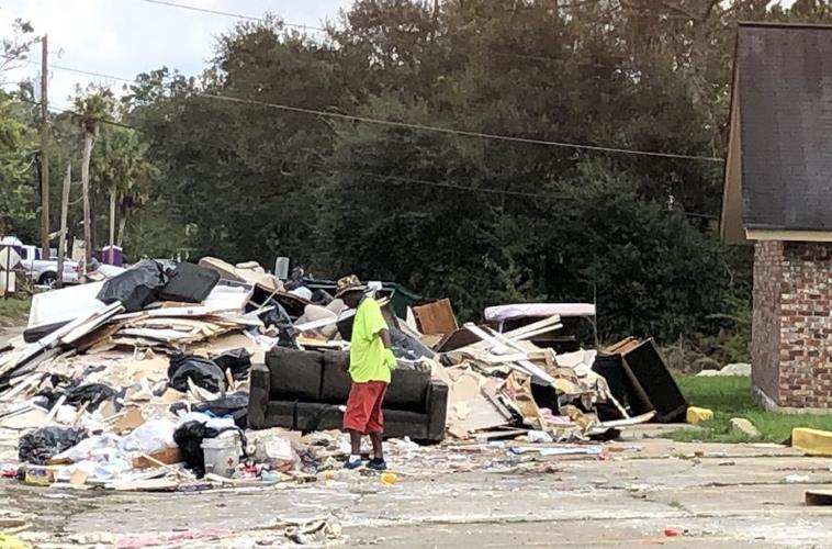 People still live amid garbage News