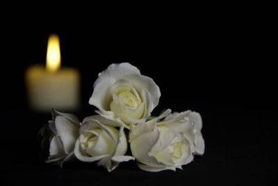Obituary Flower and candle