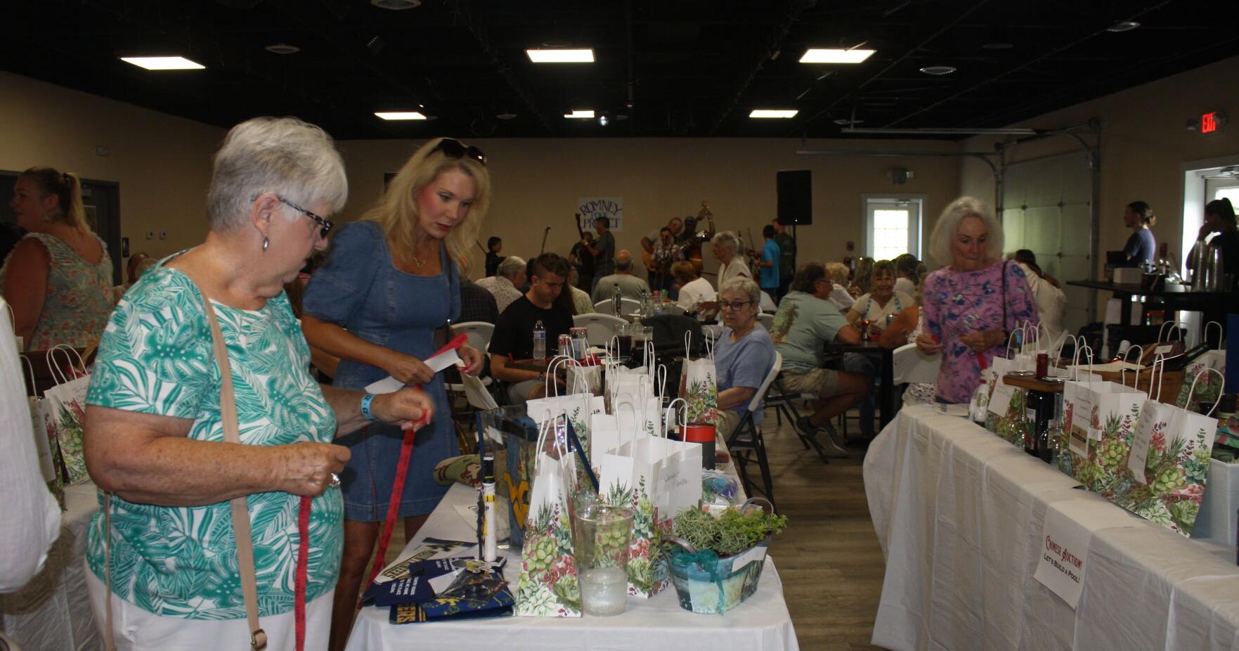 Bluegrass, BBQ event pooled in $11,500 for Romney Pool Project - Vimarsana News