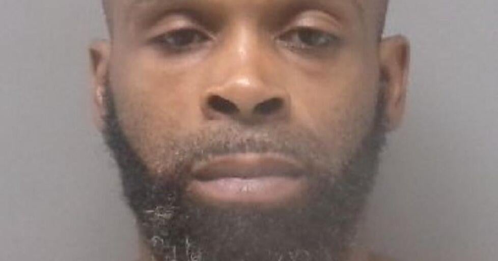 Man accused of breaking into house with weapon