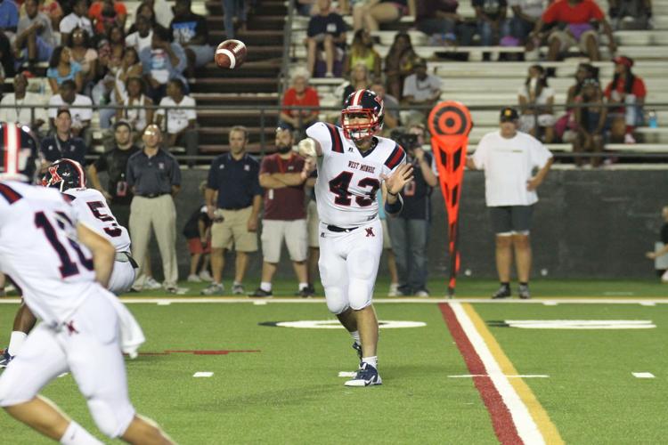 West Monroe senior quarterback Dustin Mitchell (#43)