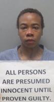 Monroe woman accused   of battering officer