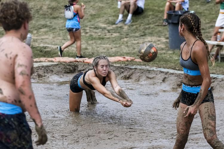 Friday photos from 43rd annual mud volleyball tournament