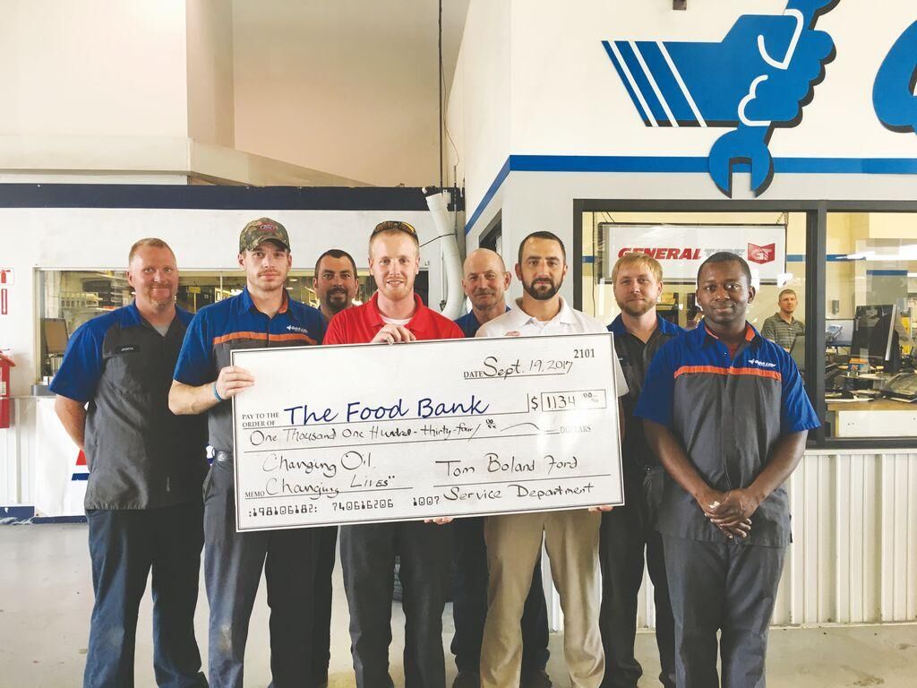 Tom Boland Ford donates to The Food Bank for Central & Northeast Missouri |  Article 