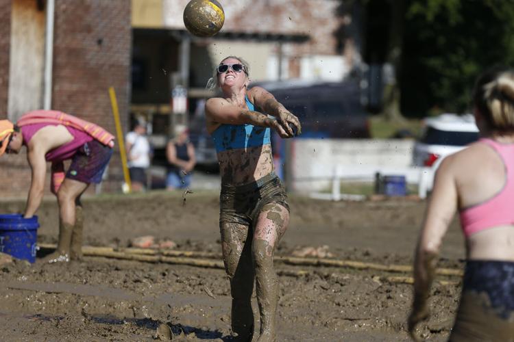 Sunday photos from 43rd annual mud volleyball tournament