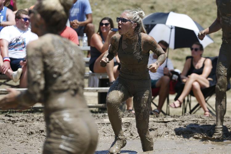 Sunday photos from 43rd annual mud volleyball tournament