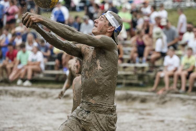 Saturday photos from 43rd annual mud volleyball tournament