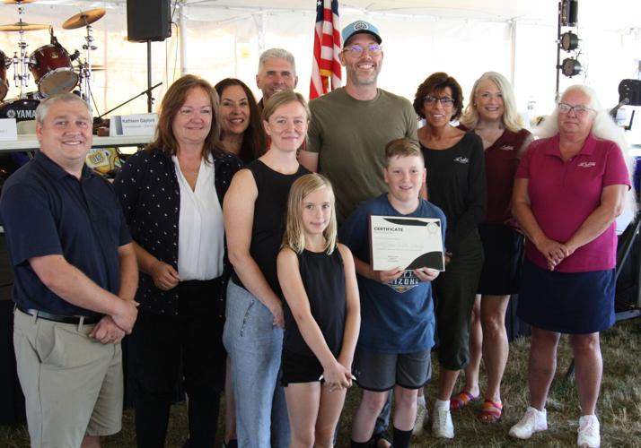 The Dakota County Board of Commissioners recognized Little Hill Berry Farm owners Aaron Wills and Molly McGovern Wills as the University of Minnesota Extension Services 2022 Farm Family of the Year at the Dakota County Fair Aug. 9. Pictured (from left) ...