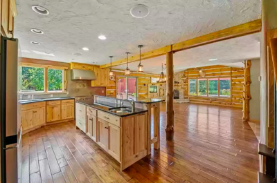 Log posts and wood accents give this Hastings, Minnesota, house for sale an "up north" feeling