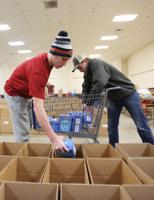 HC mens basketball team helps with Goodfellows
