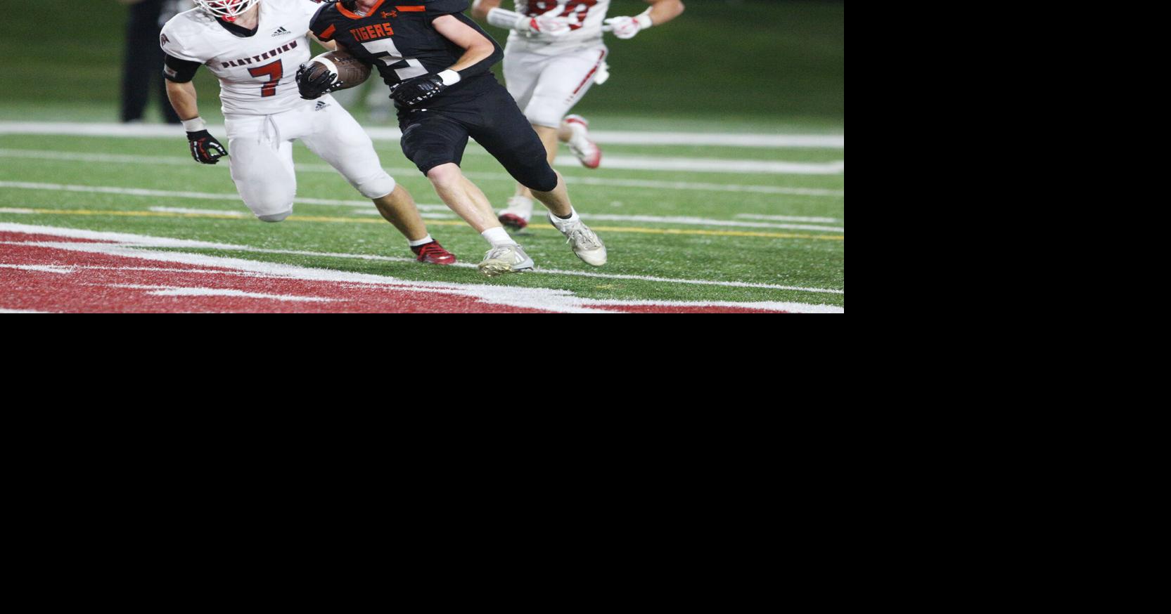 Tigers take early lead before Trojans rally for 20-12 win