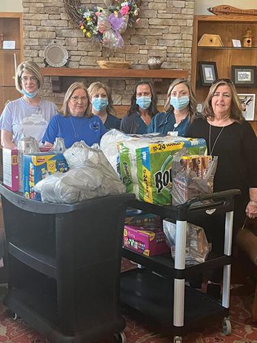 Women’s Club donates to hospice center