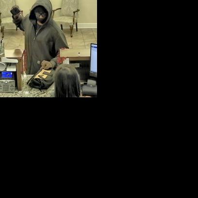 Truck driver charged after bank robbery and shootout