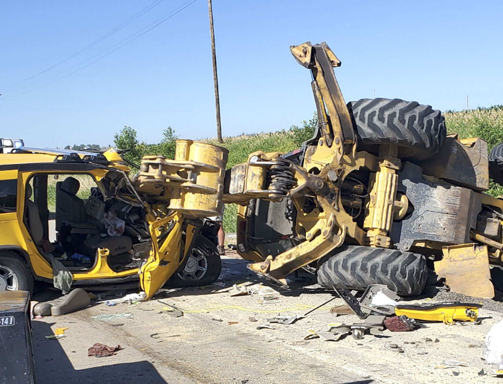 SUV and Backhoe Collision Closed Hwy. 169 for Several Hours