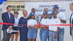 A home for a hero: Injured veteran receives new house