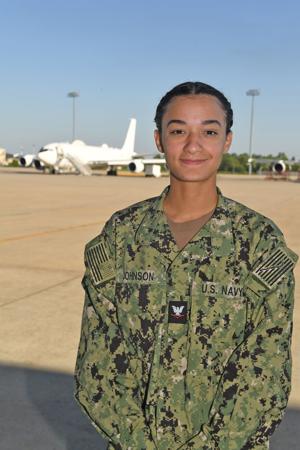 Ola grad serving in Fleet Air Reconnaissance Squadron Four