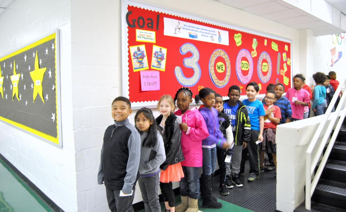 Stockbridge Elementary students tape principals to school wall