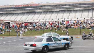 atlanta motor speedway teen driving Cop man penis throw