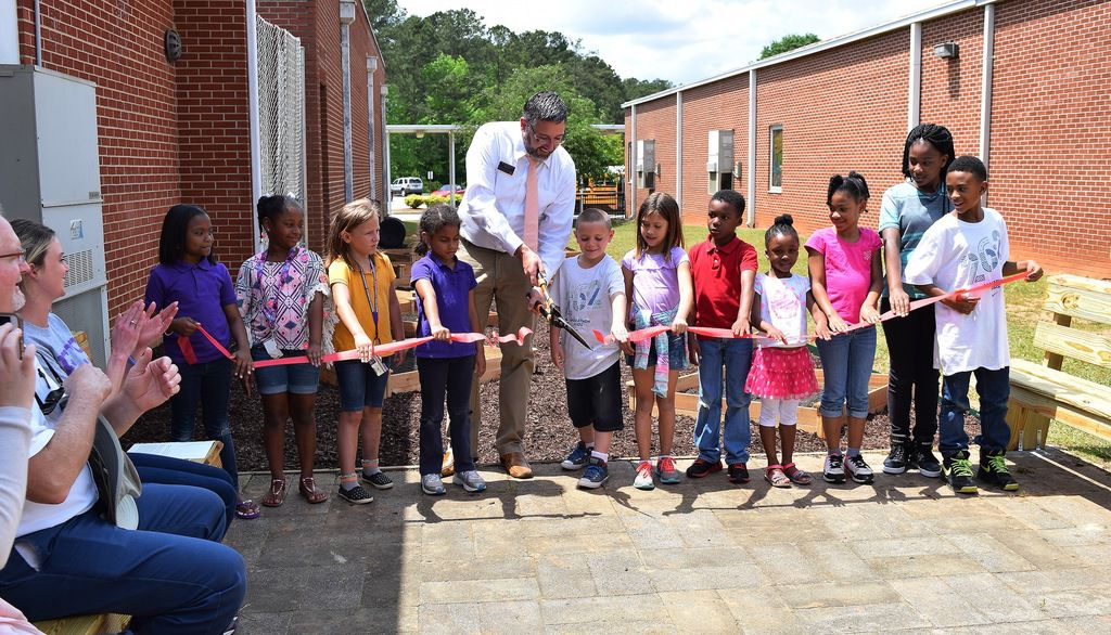 Hampton Elementary Charter opens new learning garden News