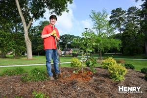 Moss plants lasting mark across Henry County Schools