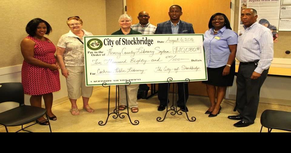 Cochran Library receives check from Stockbridge for Saturday hours
