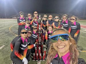 Ola band earns Grand Champion trophy at Marching Festival