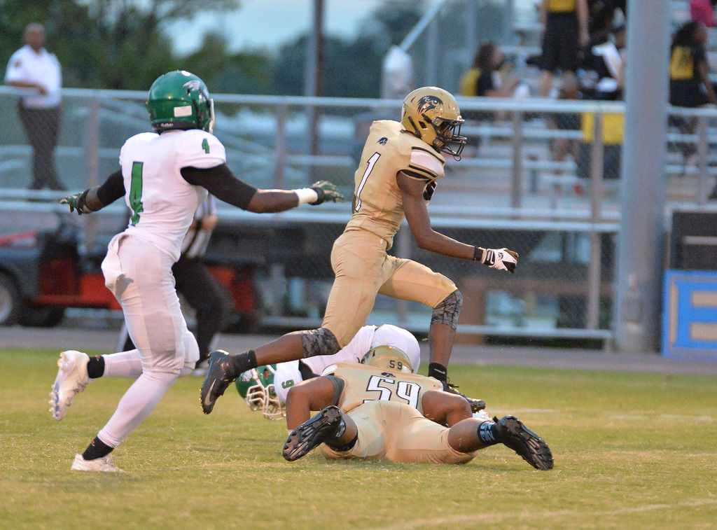 FOOTBALL McIntosh tops Henry County despite Thomas’ big night Sports