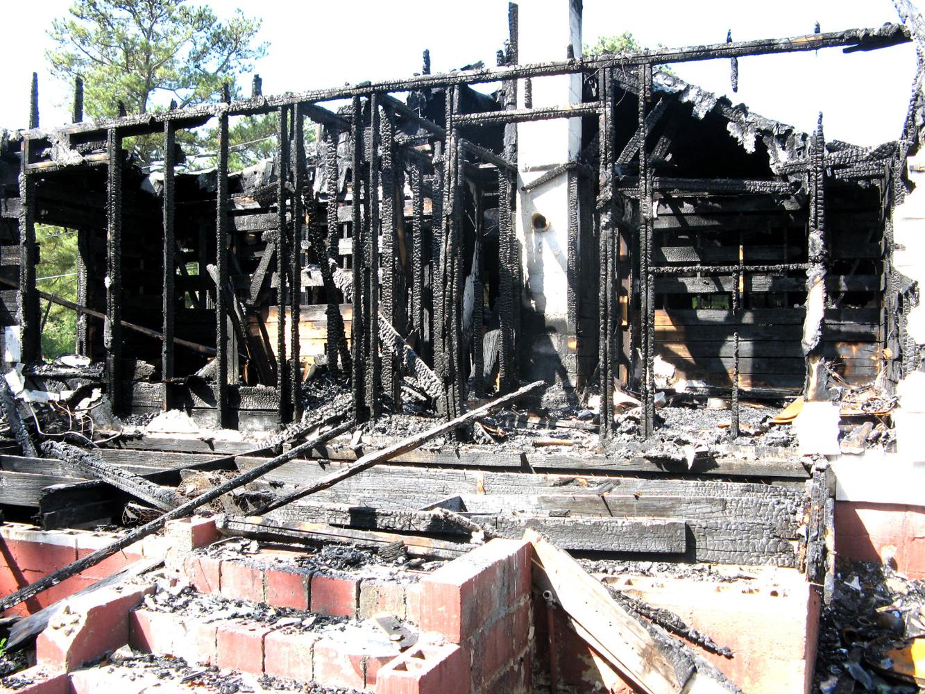 Man charged with burning down his house News