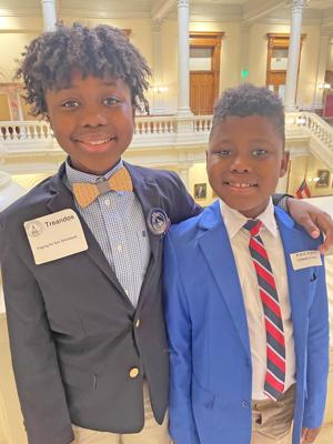 Brothers lead community food, toy and book drive