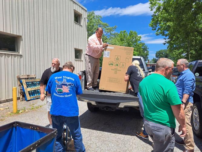 Huntington Elks members donate washer and dryer sets to Veterans Home