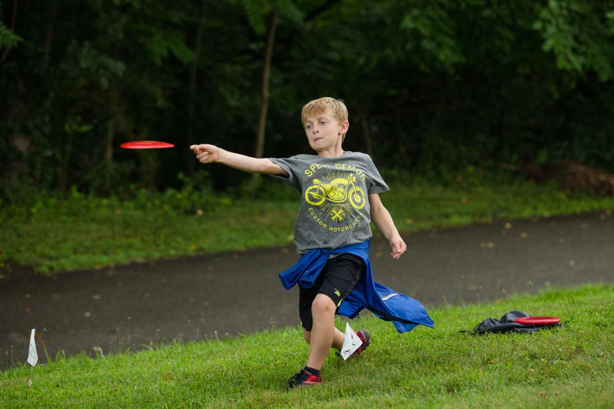 Kids learn art of disc golf Features/Entertainment