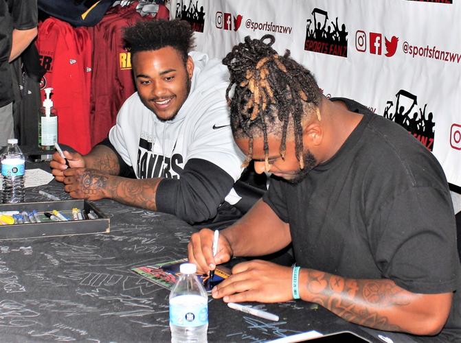 WVU football stars sign autographs at Sports Fanz Putnam News