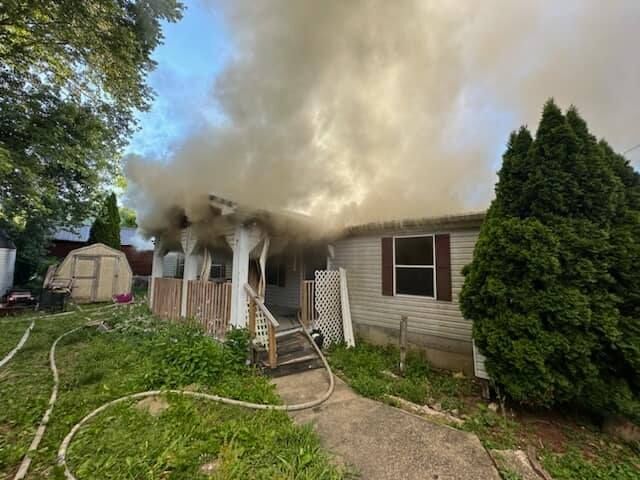 Crews battle heavy fire, smoke conditions at house fire | News | herald ...