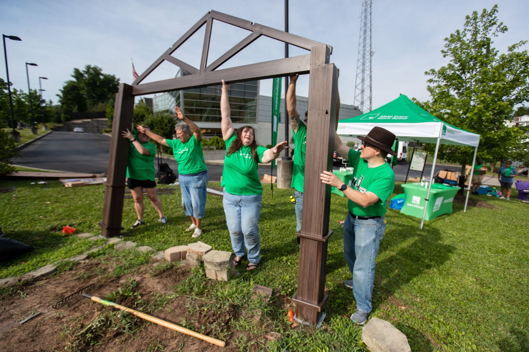 Volunteers work on upgrades at Gallaher Village Square - Vimarsana News