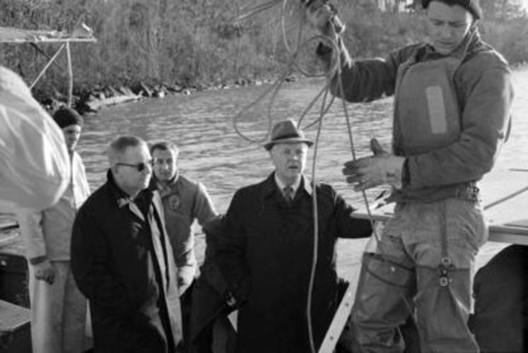 West Virginia Governor Hulett C. Smith prepares to get a closer view of the wreckage from the Silver Bridge collapse at Point Pleasant.