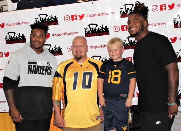 WVU football stars sign autographs at Sports Fanz Putnam News