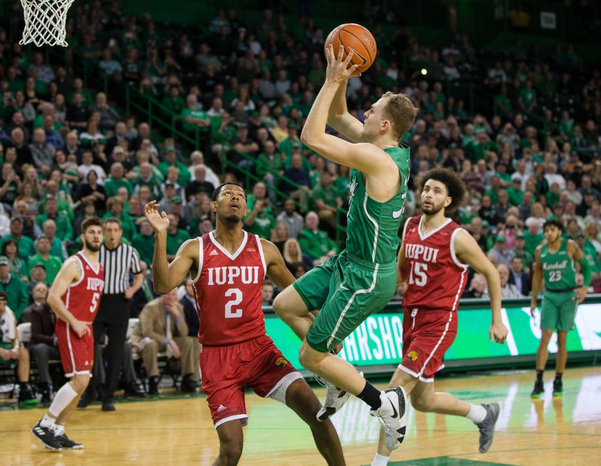Elmore Gets Mu Scoring Record Herd Gets Cit Win Over Iupui