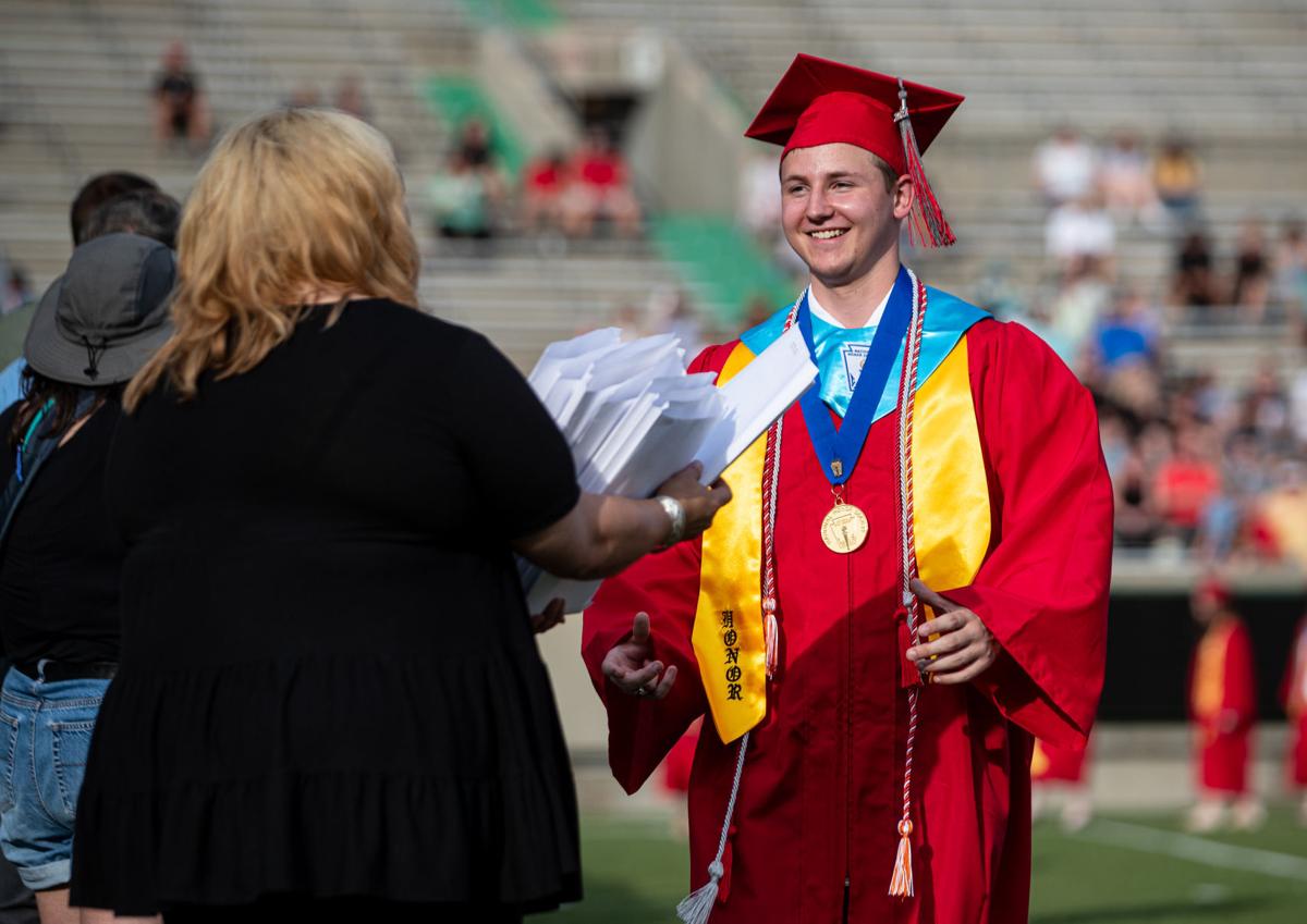 More than 400 Knights turn their tassels, marking end of high school