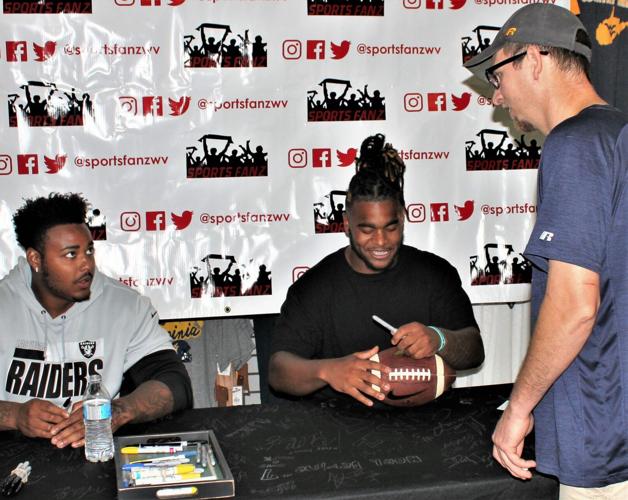 WVU football stars sign autographs at Sports Fanz Putnam News