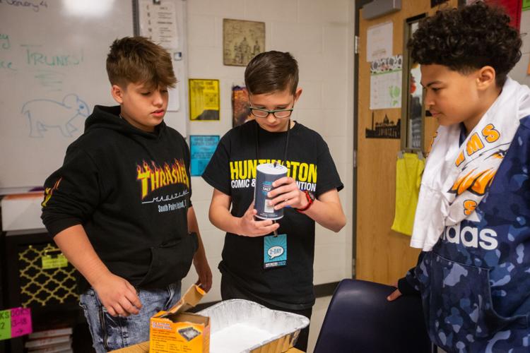 Photos: Students mummify chickens at Huntington Middle School ...