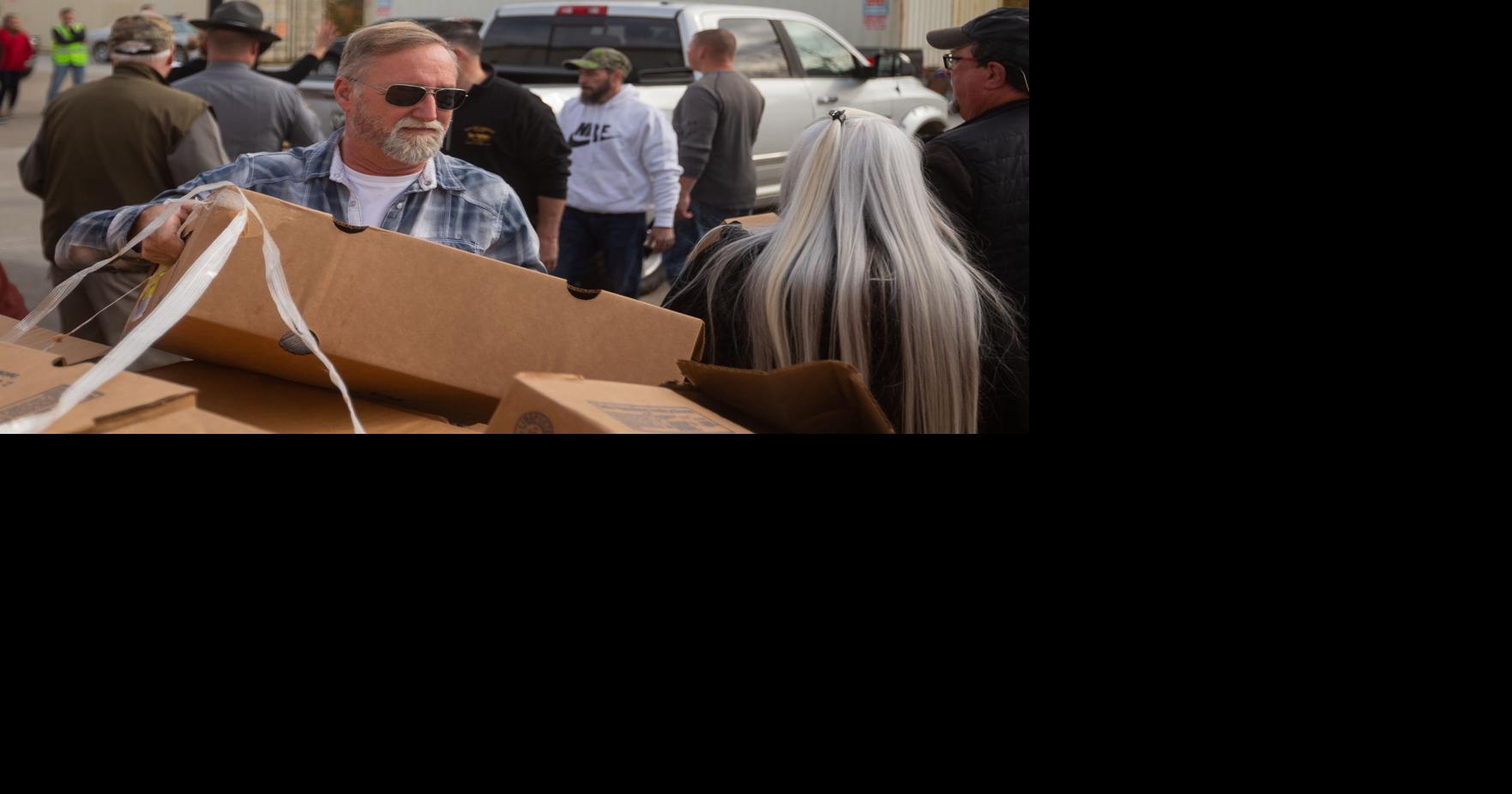 Group distributes nearly 1,000 turkeys ahead of holiday season | News ...